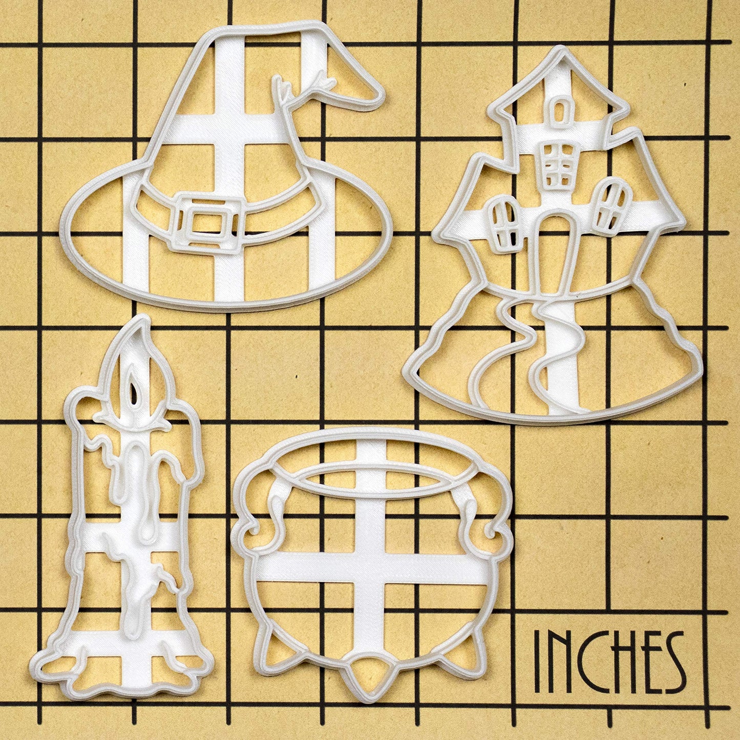 Set of 4 Witchcraft theme cookie cutters (Designs: Candle, Cauldron, Witch Hat, and Haunted House), 4 pieces - Bakerlogy